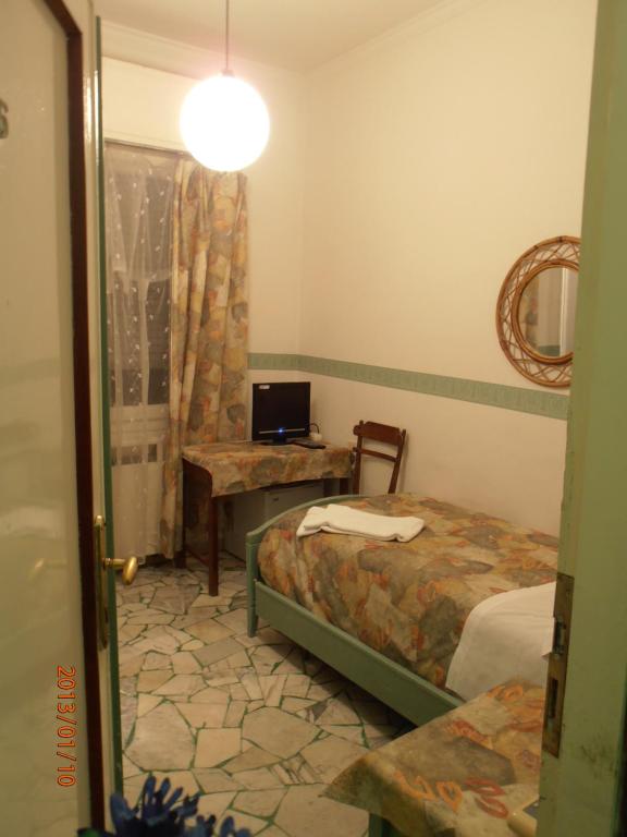 Одноместный (Одноместный номер с общей ванной комнатой) гостевого дома Souvenir Maya, Флоренция