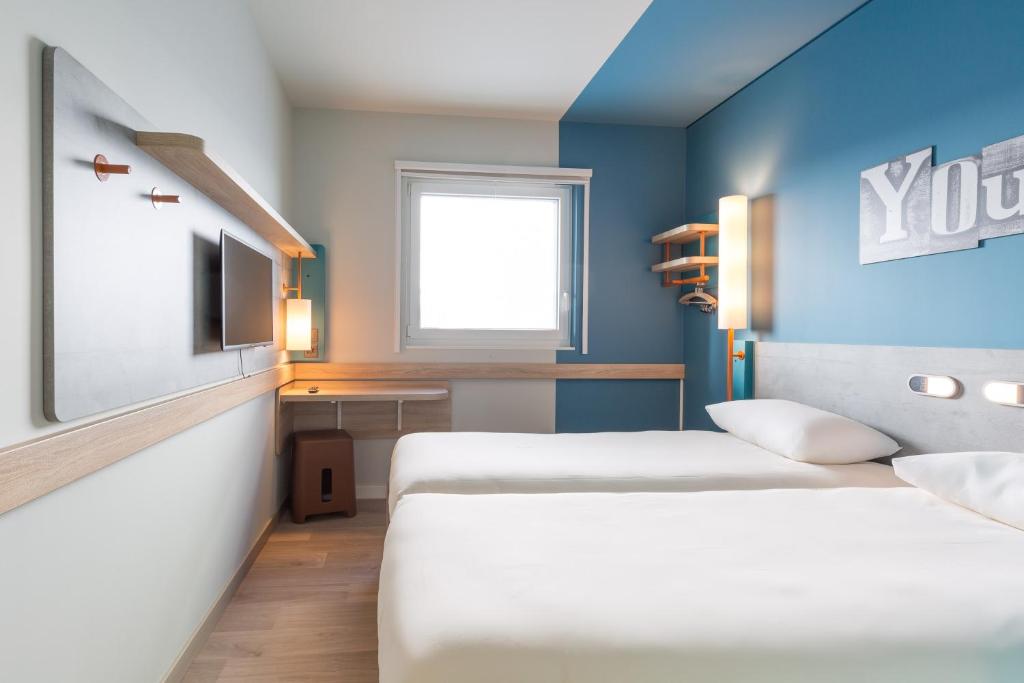 Двухместный (Двухместный номер с 1 кроватью или 2 отдельными кроватями) отеля ibis budget Geneve Palexpo Aeroport, Женева