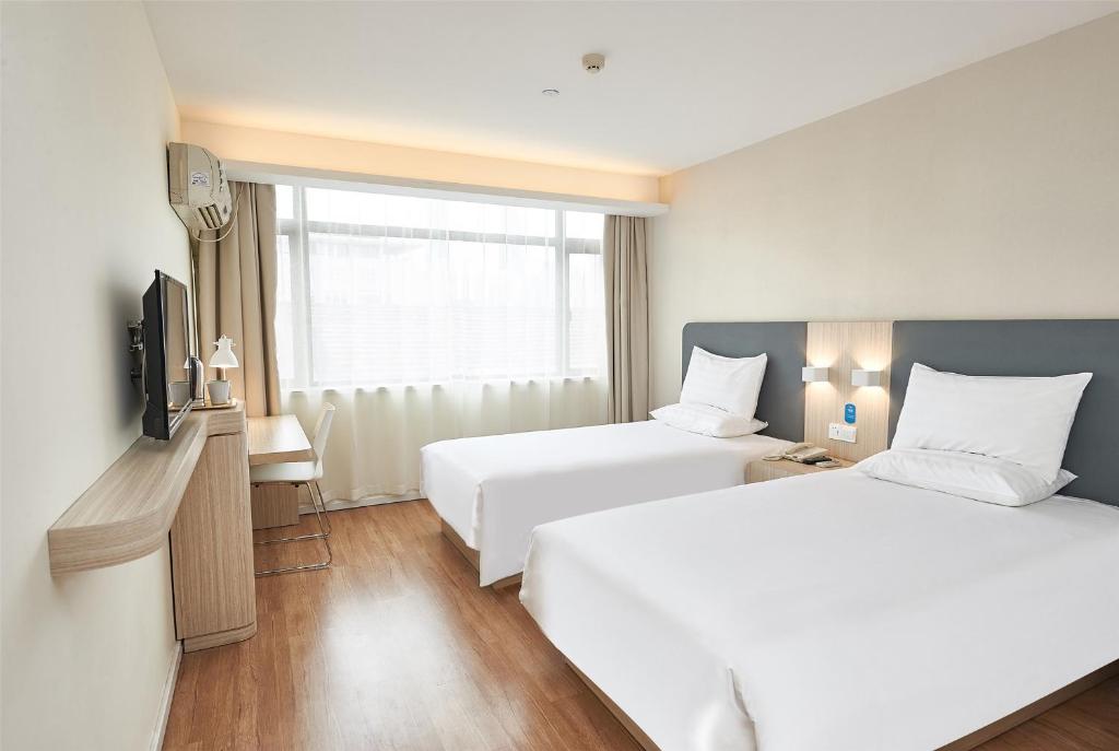 Двухместный (Для граждан материкового Китая ‒ Двухместный номер с 2 отдельными кроватями) отеля Hanting Hotel Beijing Xidan, Пекин