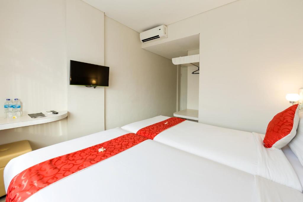 Двухместный (Улучшенный двухместный номер с 1 кроватью или 2 отдельными кроватями и гидромассажной ванной) отеля The Rinaya Canggu, Чангу