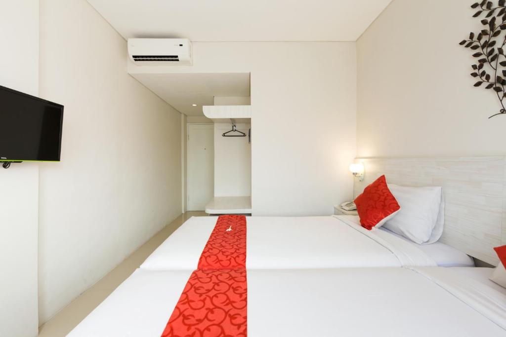 Двухместный (Улучшенный двухместный номер с 2 отдельными кроватями) отеля The Rinaya Canggu, Чангу