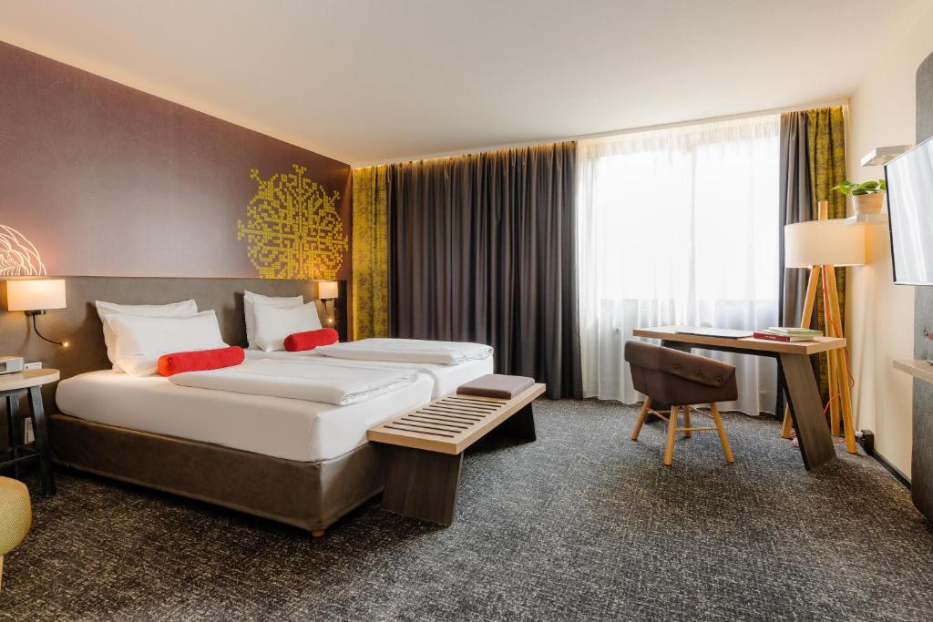 Двухместный (Улучшенный двухместный номер с 2 отдельными кроватями) отеля Mercure München City Center, Мюнхен
