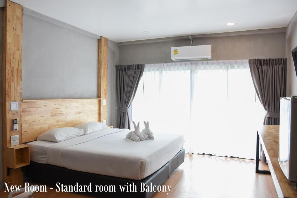 Двухместный (Стандартный двухместный номер с 1 кроватью или 2 отдельными кроватями и балконом) отеля Basaya Beach, Паттайя