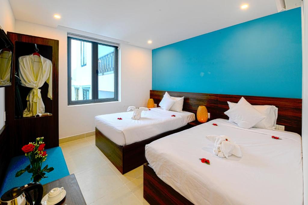 Двухместный (Бюджетный двухместный номер с 2 отдельными кроватями) отеля Phuoc An Hotel, Хойан