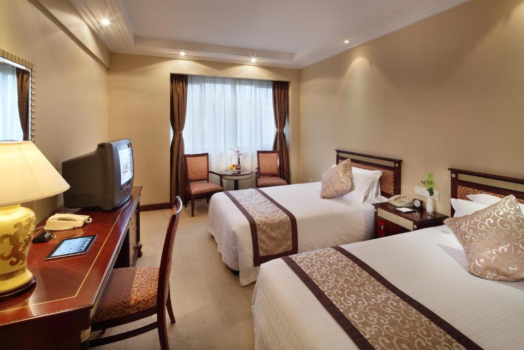 Двухместный (Улучшенный двухместный номер с 1 кроватью) отеля Shanghai Hotel Jin Jiang, Шанхай