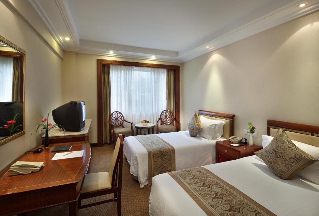 Двухместный (Стандартный двухместный номер с 2 отдельными кроватями) отеля Shanghai Hotel Jin Jiang, Шанхай
