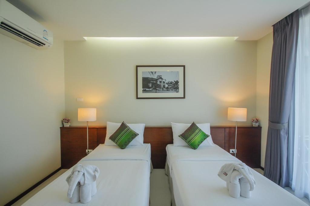 Двухместный (Улучшенный двухместный номер с 2 отдельными кроватями) отеля Baannilrath Hotel, Хуахин