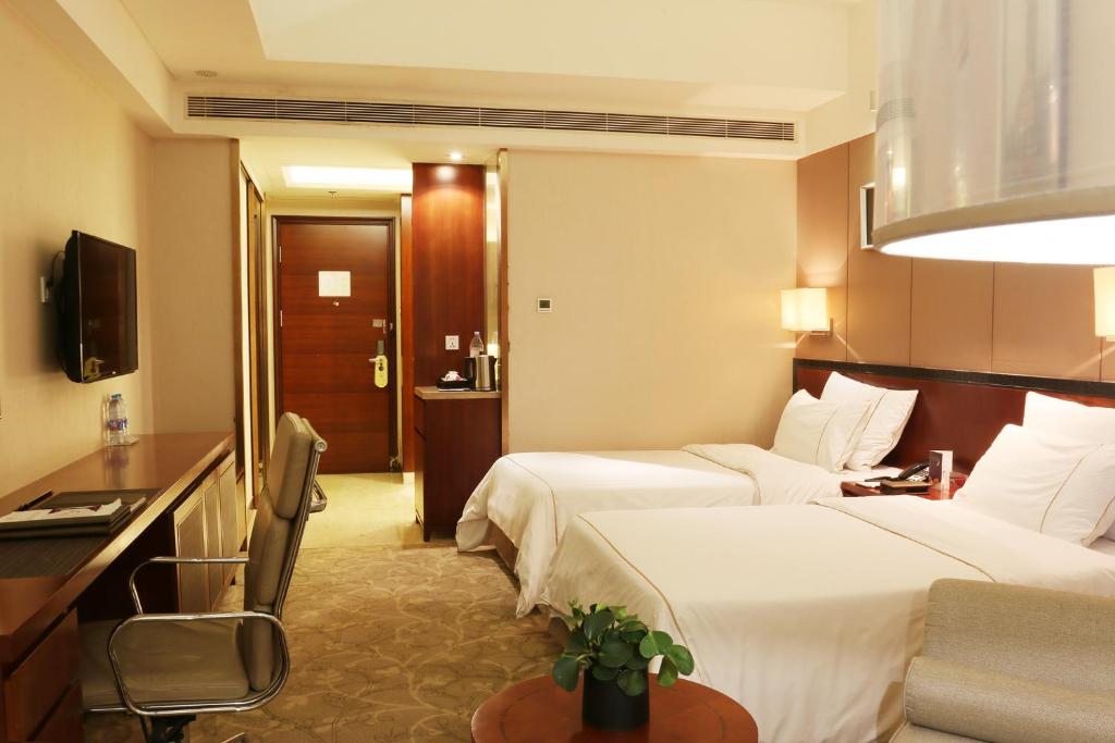 Двухместный (Специальное предложение - Двухместный номер с 2 отдельными кроватями (маленькое окно)) отеля Cavan Hotel, Гуанчжоу