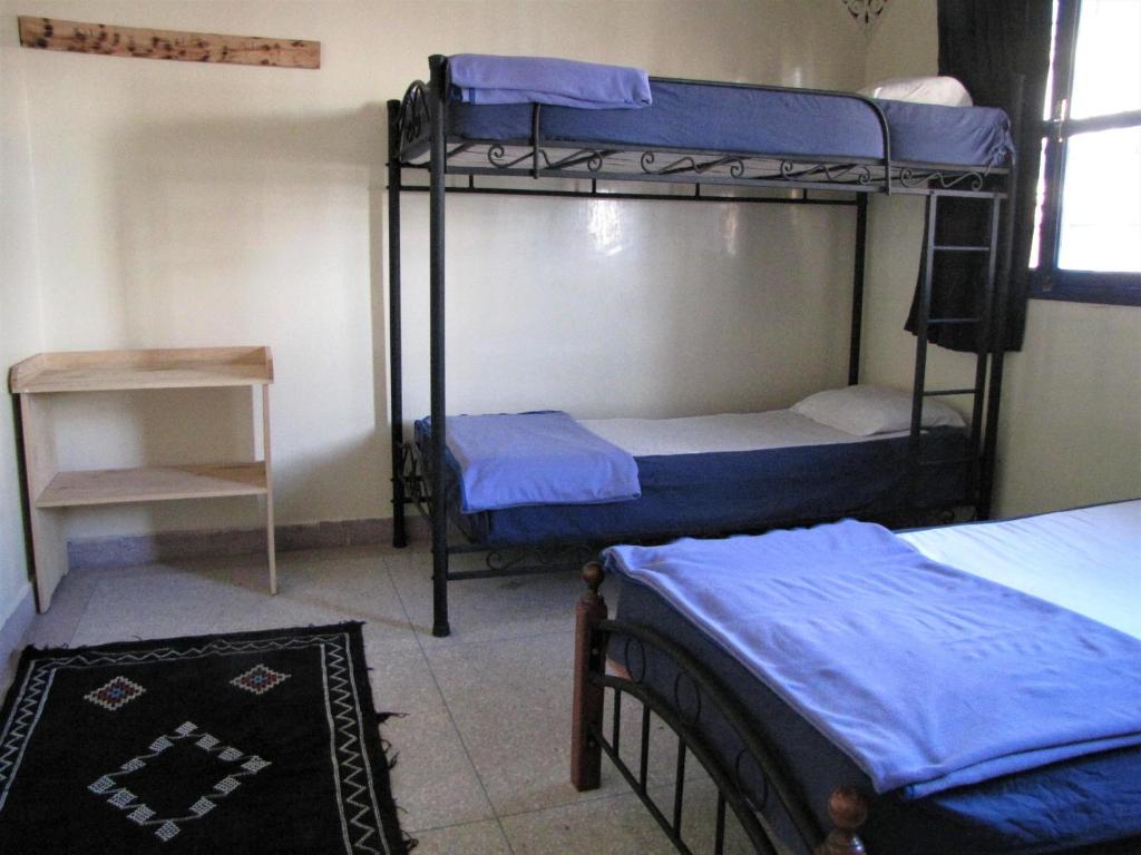 Номер (Односпальная кровать в общем номере для мужчин и женщин) отеля Surf & Travel Hostel, Тагазут