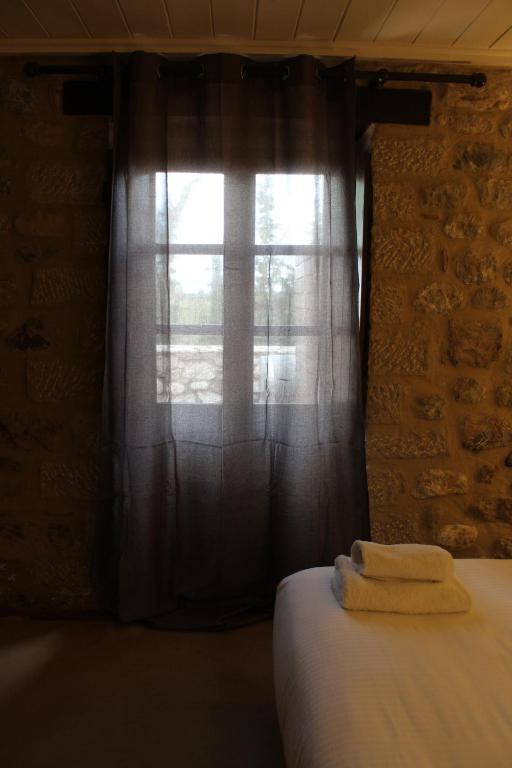 Двухместный (Стандартный двухместный номер с 1 кроватью или 2 отдельными кроватями) отеля Semantron Traditional Village, Элеонас