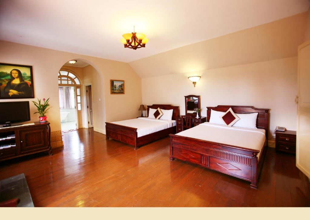Двухместный (Двухместный номер Джуниор с 2 отдельными кроватями) отеля Dalat Cadasa Resort, Далат