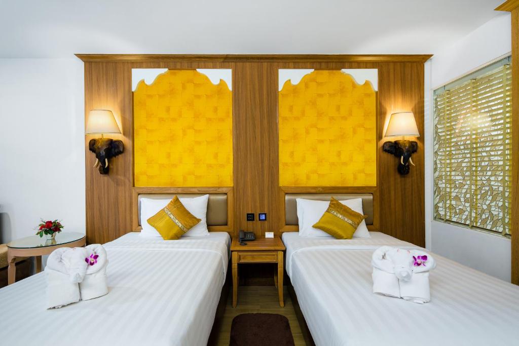 Двухместный (Двухместный номер Делюкс с 1 кроватью или 2 отдельными кроватями) отеля Aiyara Palace, Паттайя