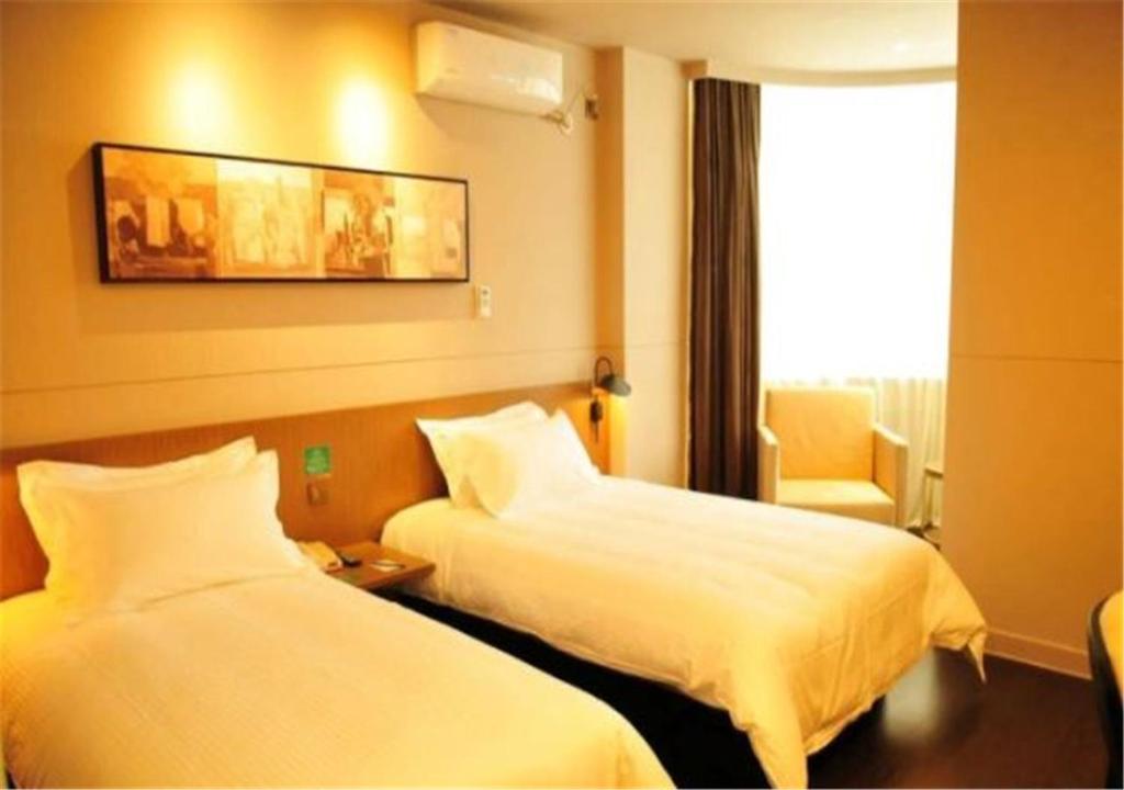 Двухместный (Стандартный двухместный номер А с 2 отдельными кроватями) отеля Jinjiang Inn Dali Erhai Lake Park, Дали