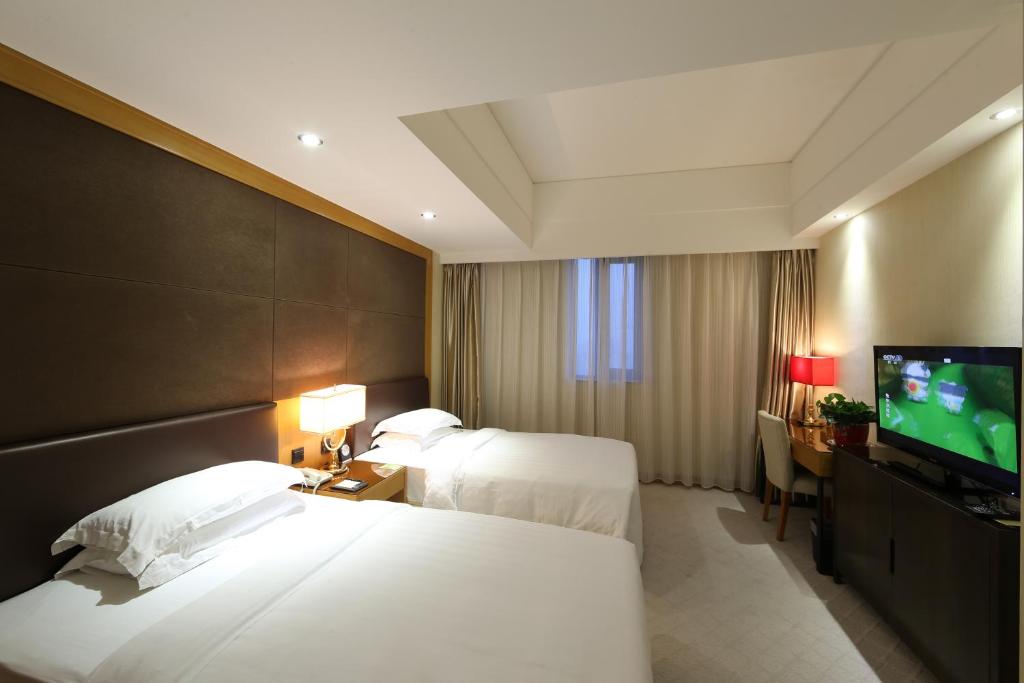 Двухместный (Двухместный номер Делюкс с 2 отдельными кроватями) отеля Aurum International Hotel, Сиань