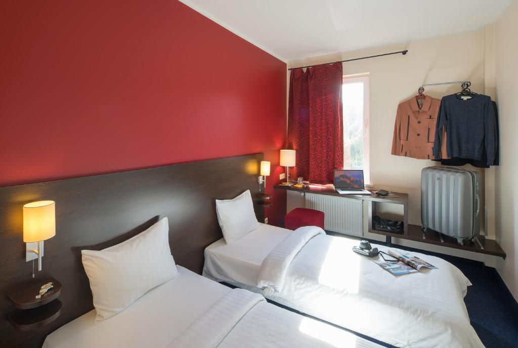 Двухместный (Двухместный номер с 2 отдельными кроватями) отеля Dodo Hotel, Рига