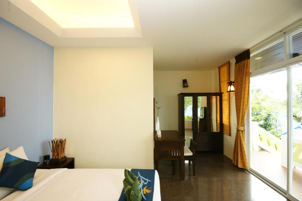 Двухместный (Улучшенный двухместный номер с 1 кроватью или 2 отдельными кроватями) курортного отеля Tharathip Resort Koh Phangan, Пханган