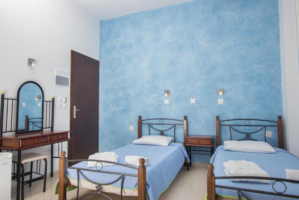 Двухместный (Улучшенный двухместный номер с 1 кроватью или 2 отдельными кроватями и видом на море) гостевого дома Villa Pelekanos, Картерадос