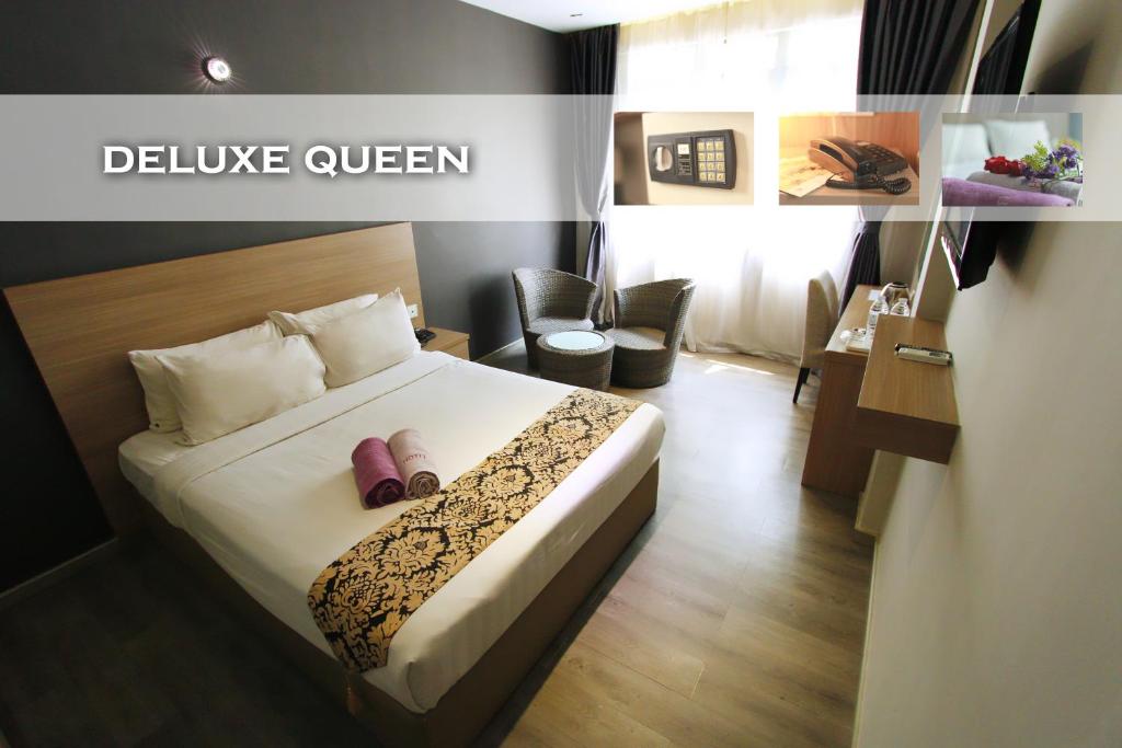 Двухместный (Номер Делюкс с кроватью размера «queen-size» (с окном)) отеля Hotel 99 Kuala Lumpur City, Куала-Лумпур