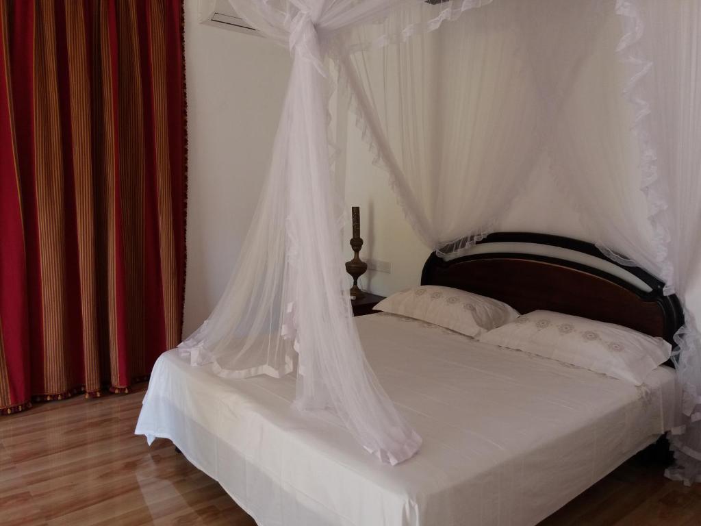 Двухместный (Двухместный номер с 1 кроватью или 2 отдельными кроватями и дополнительной кроватью) отеля Hotel La Felicita, Мирисса