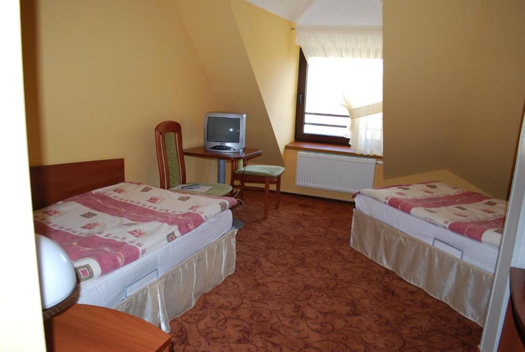 Четырехместный (Четырехместный номер - Мансарда) отеля Hotel Anka, Слубице