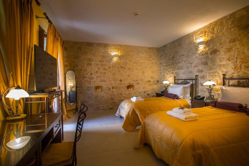 Двухместный (Двухместный номер с 2 отдельными кроватями - Подходит для гостей с ограниченными физическими возможностями) отеля Mystras Grand Palace Resort, Спарта