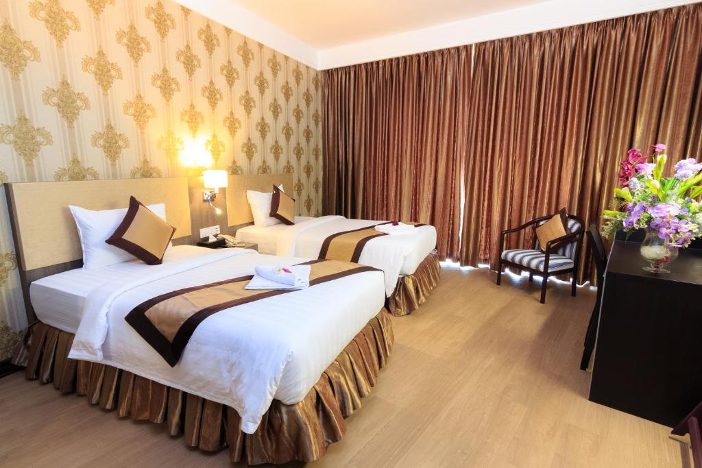 Двухместный (Двухместный номер Делюкс с 2 отдельными кроватями) отеля Paradise Hotel, Пномпень