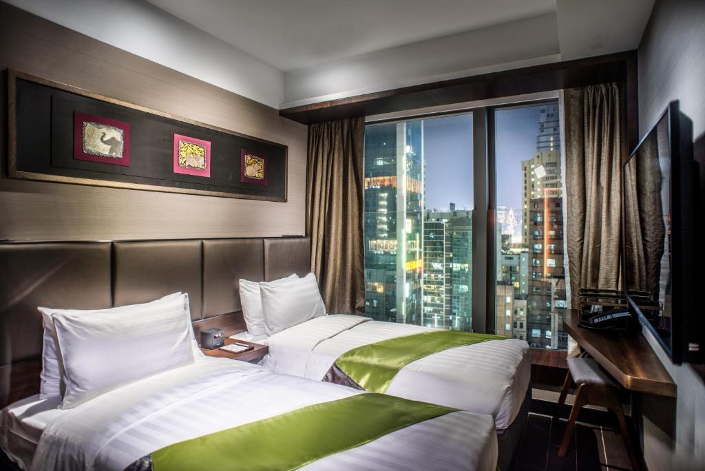 Двухместный (Двухместный номер Делюкс с 2 отдельными кроватями) отеля Soravit on Granville, Гонконг (город)
