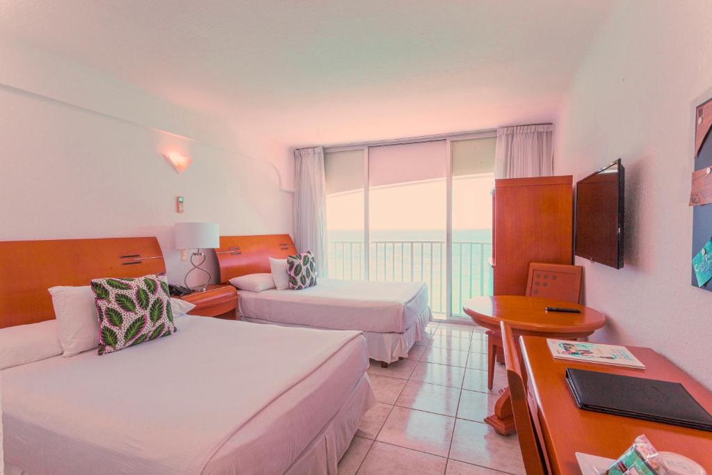 Двухместный (Двухместный номер «Делюкс» с 1 кроватью, прямой вид на океан) отеля Coral Princess Golf & Dive Resort, Косумель