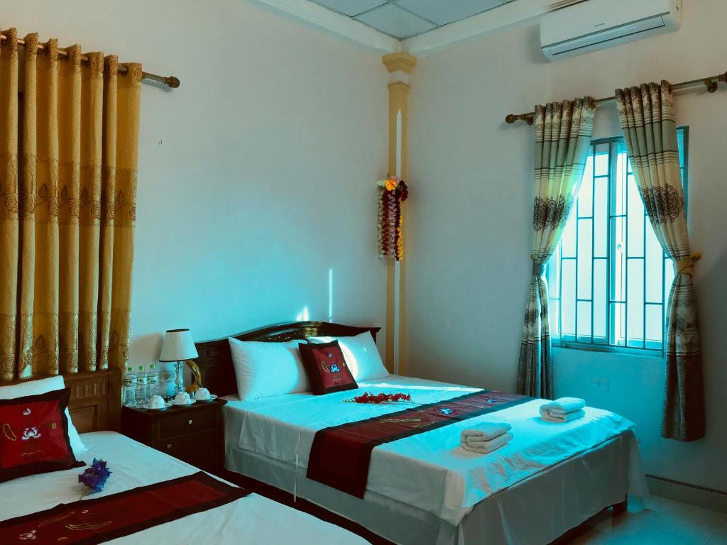Двухместный (Двухместный номер Делюкс с 2 отдельными кроватями) хостела Hoa Luan Restaurant Hostel, Ниньбинь