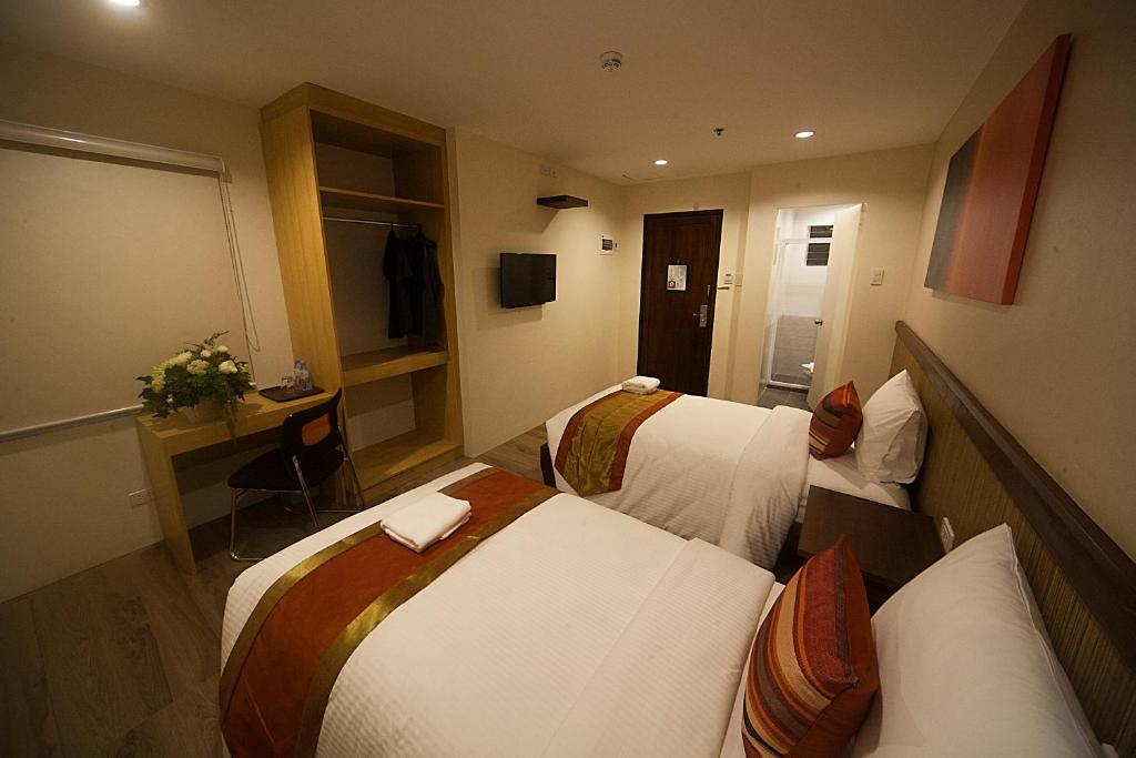 Двухместный (Стандартный двухместный номер с 2 отдельными кроватями) отеля NS Royal Hotel, Себу
