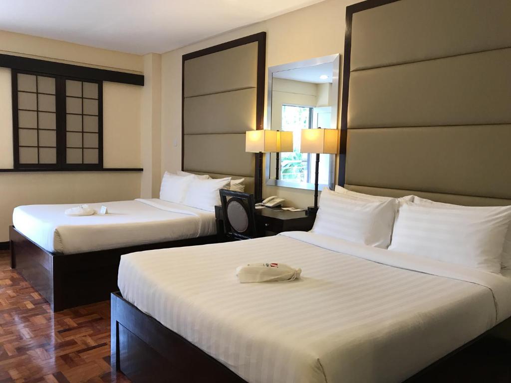 Двухместный (Двухместный номер с 1 кроватью или 2 отдельными кроватями) отеля Jinjiang Inn Boracay Station 1, Боракай