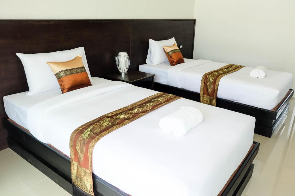 Двухместный (Двухместный номер Делюкс с 2 отдельными кроватями) курортного отеля The Oasis Khaolak Resort, Кхаулак