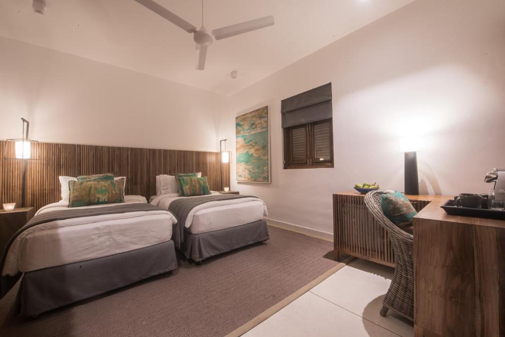 Двухместный (Двухместный номер Делюкс с 2 отдельными кроватями) отеля Kumu Beach, Балапития