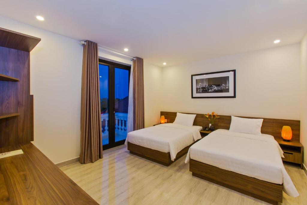 Двухместный (Двухместный номер с 2 отдельными кроватями и балконом) виллы Terrace Villa, Хойан