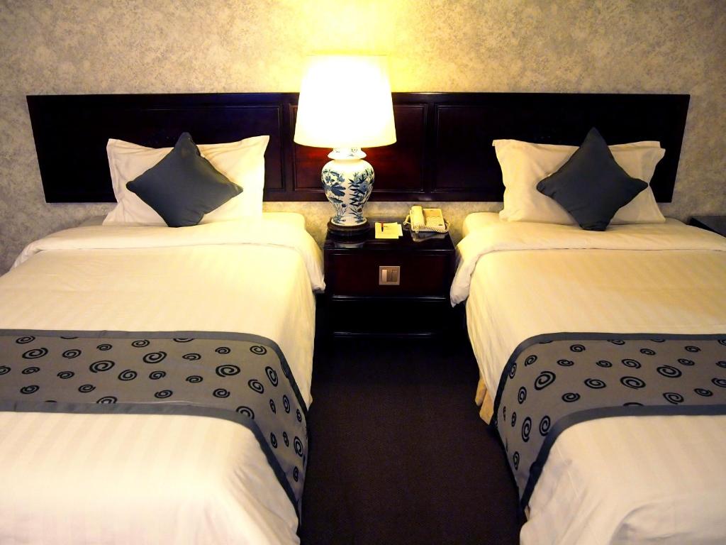 Двухместный (Специальное предложение - Улучшенный номер (бесплатное предоставление номера более высокой категории - номера Делюкс)) отеля Hotel Royal, Сингапур (город)
