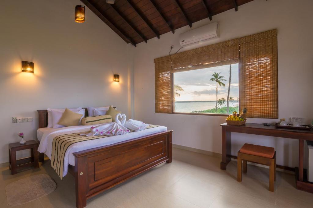 Двухместный (Двухместный номер Делюкс с 1 кроватью и балконом, вид на море) отеля Ananya Beach Resort, Тангалла