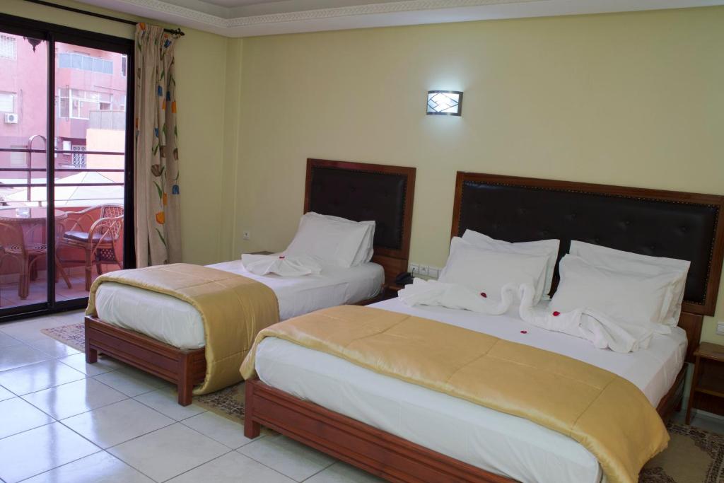 Двухместный (Стандартный двухместный номер с 1 кроватью или 2 отдельными кроватями) отеля Hotel Gomassine, Марракеш