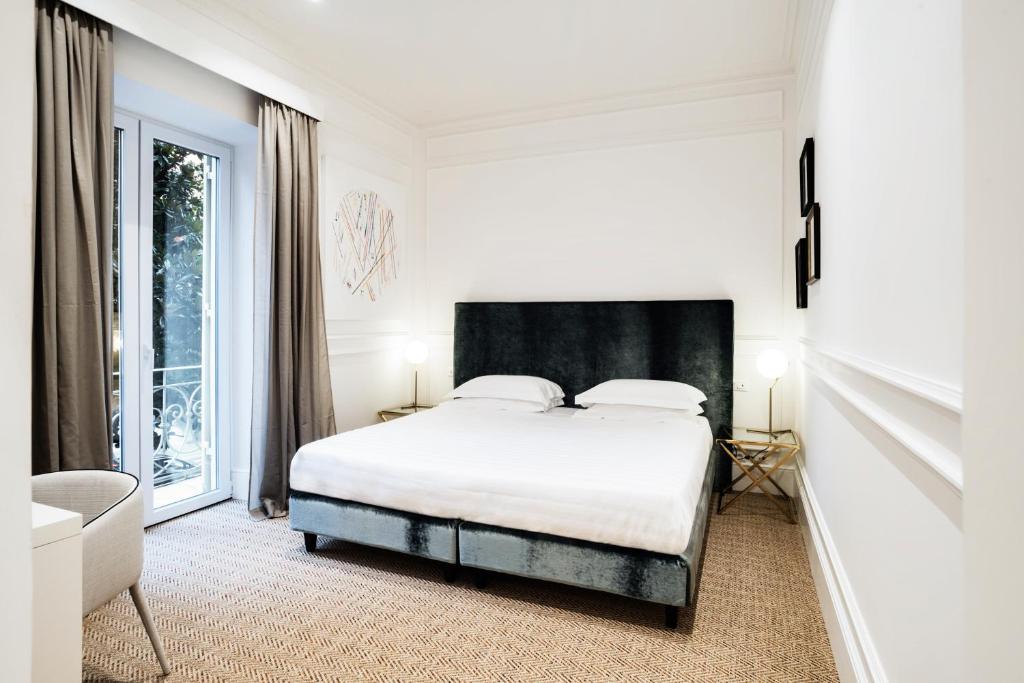 Двухместный (Двухместный номер Делюкс с 1 кроватью или 2 отдельными кроватями) отеля The Shire Hotel, Рим