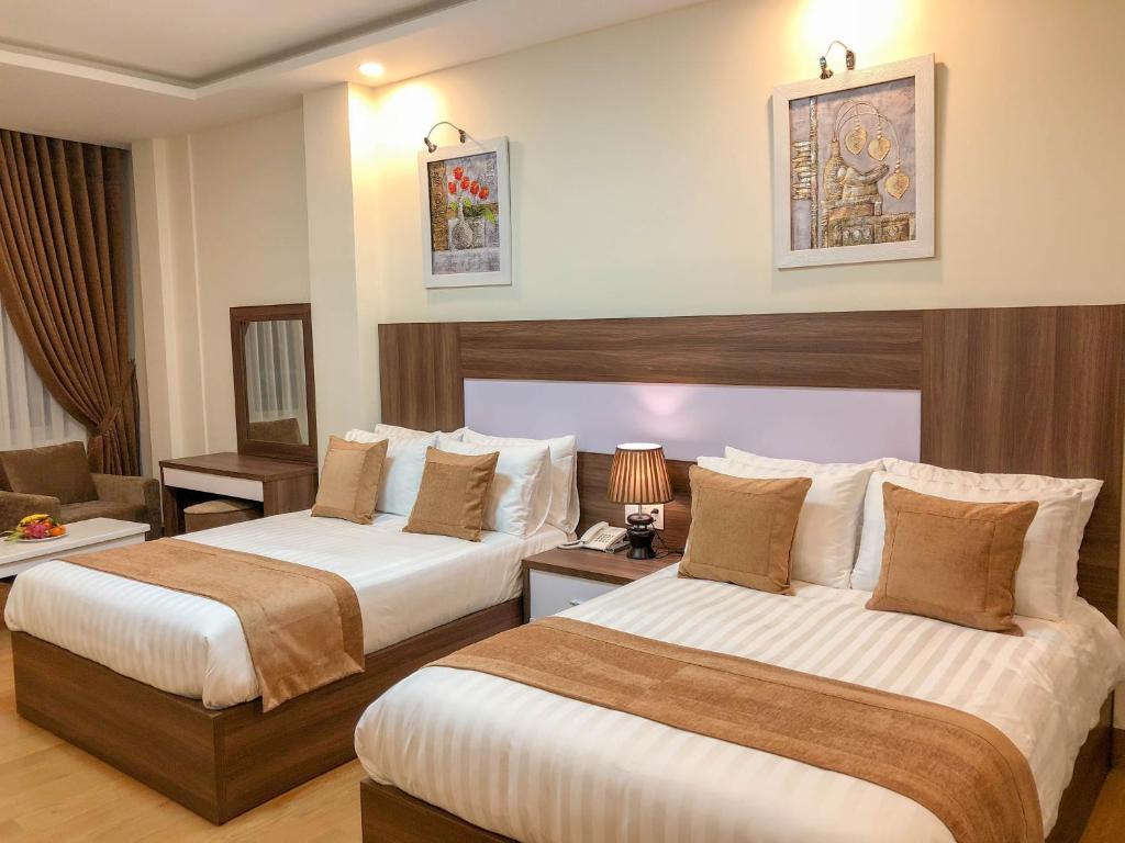 Двухместный (Двухместный номер Делюкс с 2 отдельными кроватями) отеля Hana Dalat Hotel, Далат