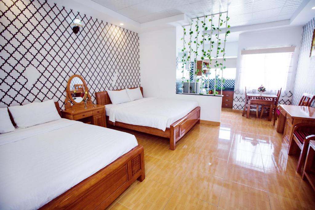 Апартаменты (Представительские апартаменты (4 взрослых)) отеля Minh Vu Hotel, Вунгтау