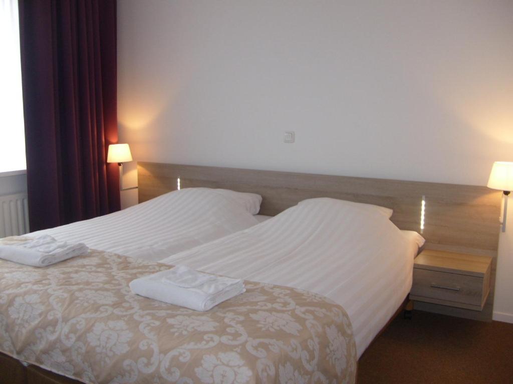 Двухместный (Двухместный номер Делюкс с 2 отдельными кроватями) отеля Hotel Norg, Гронинген