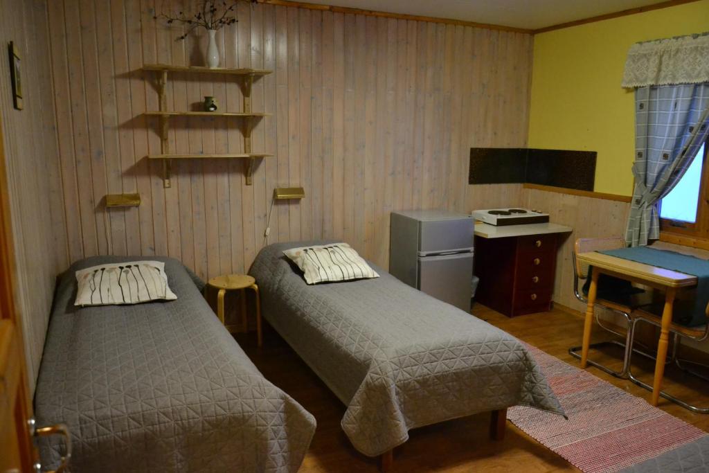 Трехместный (Трехместный номер с общей ванной комнатой) кемпинга Alta River Camping, Алта