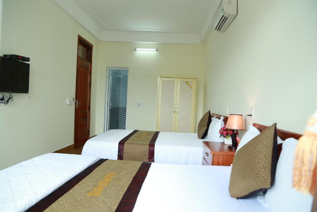 Двухместный (Двухместный номер Делюкс с 2 отдельными кроватями) отеля Gold Plus Hotel, Донгхой