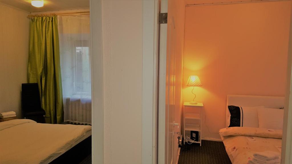 Двухместный (Двухместный номер с 1 кроватью и общей ванной комнатой) гостевого дома Vilnius Old Town accommodation, Вильнюс