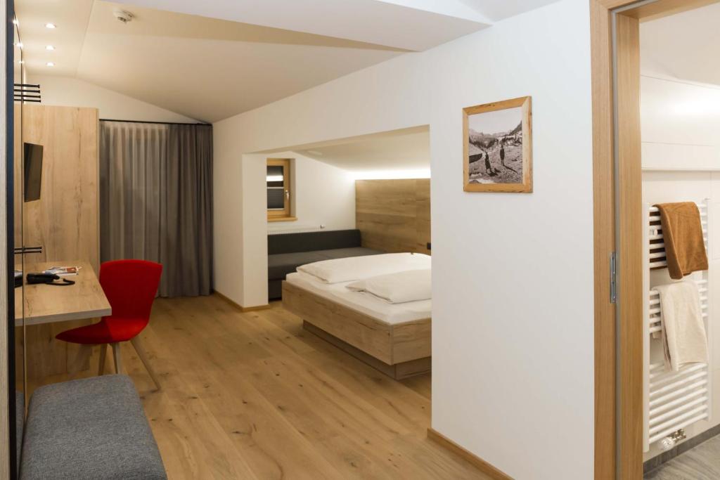 Семейный (Семейный номер (для 2 взрослых и 2 детей)) отеля Hotel Rosner, Шладминг