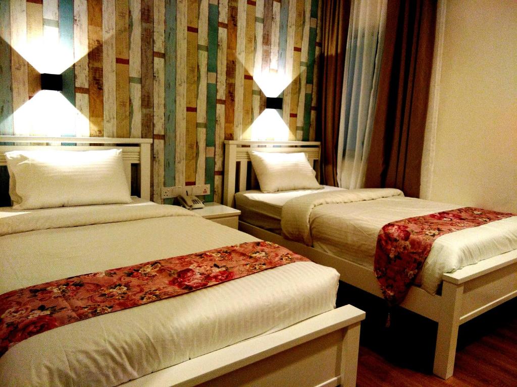 Двухместный (Стандартный двухместный номер с 2 отдельными кроватями) отеля Wifi Boutique Hotel, Джорджтаун