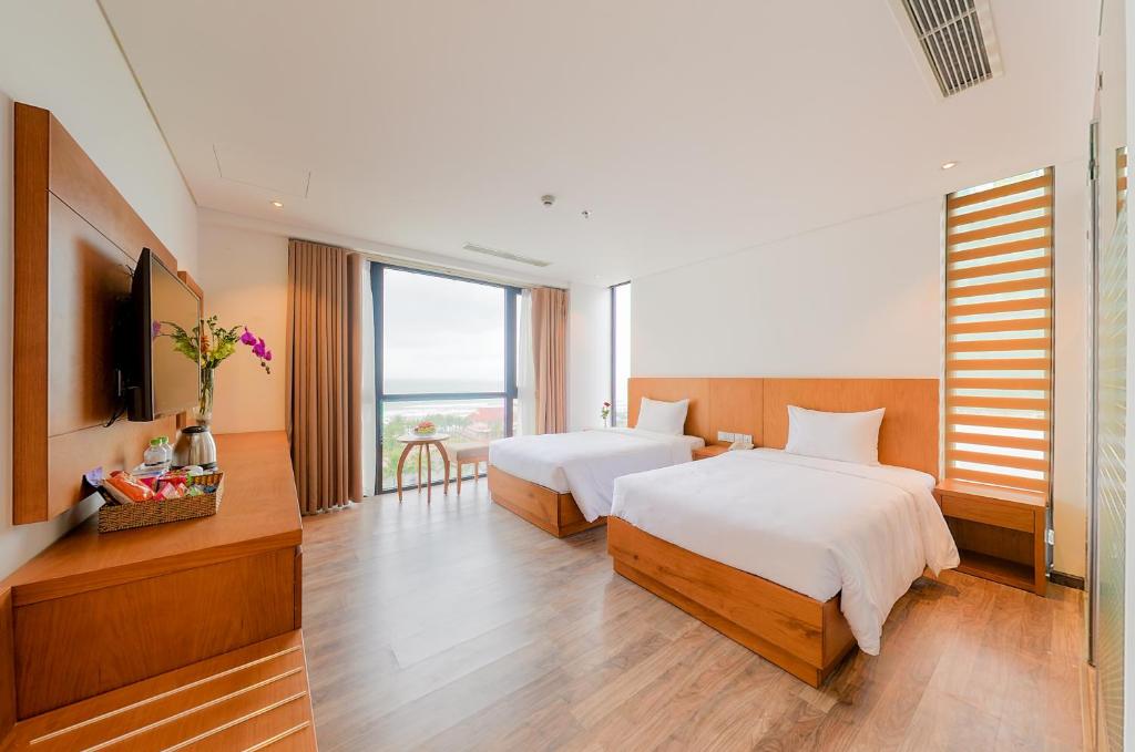 Двухместный (Двухместный номер Делюкс с 1 кроватью или 2 отдельными кроватями, вид на океан) отеля Soho Boutique Hotel, Дананг