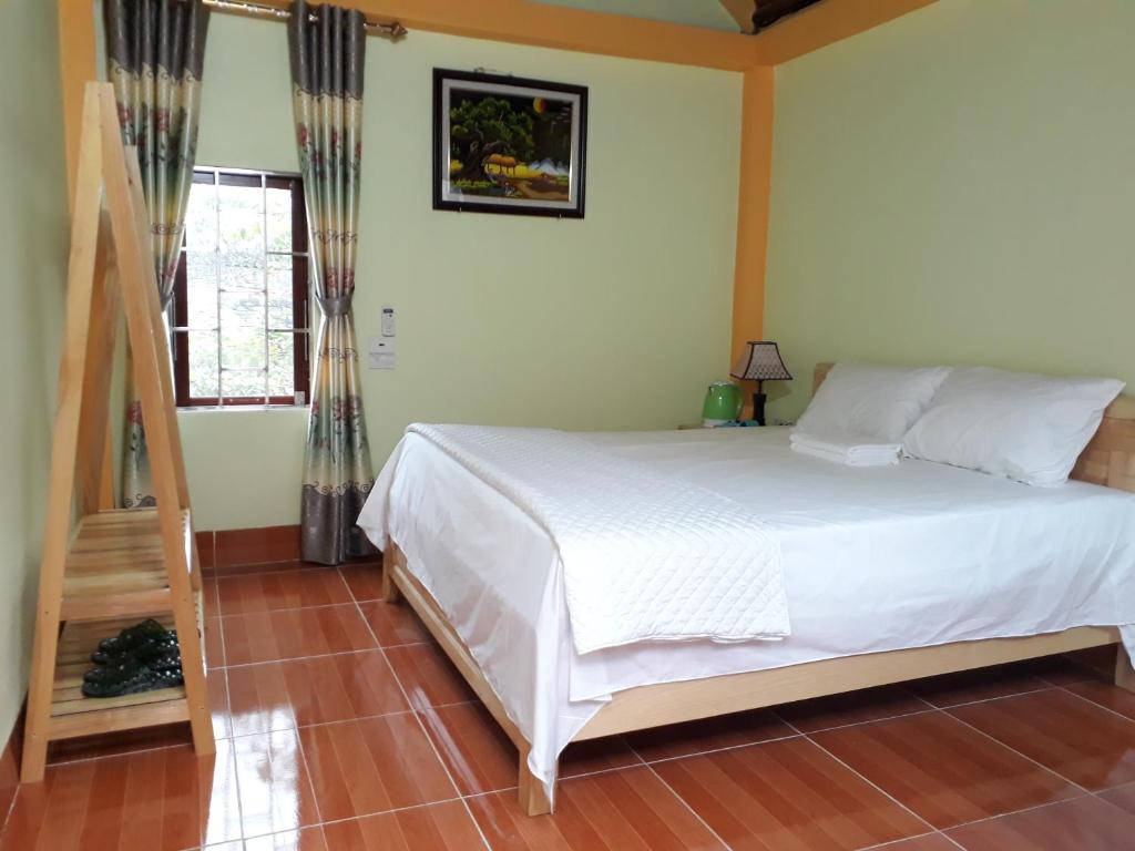 Двухместный (Двухместный номер с 1 кроватью и общей ванной комнатой) семейного отеля Tam Coc Rice Fields Homestay, Ниньбинь