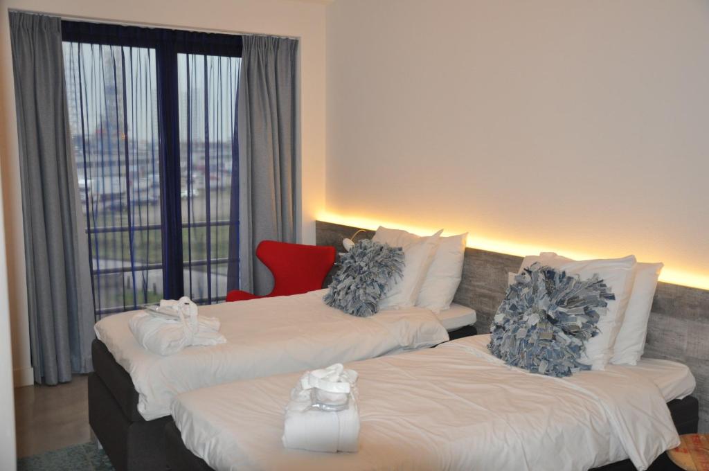 Двухместный (Двухместный номер Делюкс с 2 отдельными кроватями) отеля Hotel Rauw aan de Kade, Амстердам