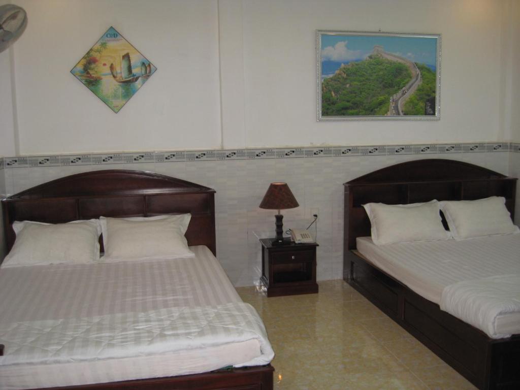 Двухместный (Двухместный номер Делюкс с 2 двуспальными кроватями) отеля Huynh Lac Can Tho Hotel, Кантхо
